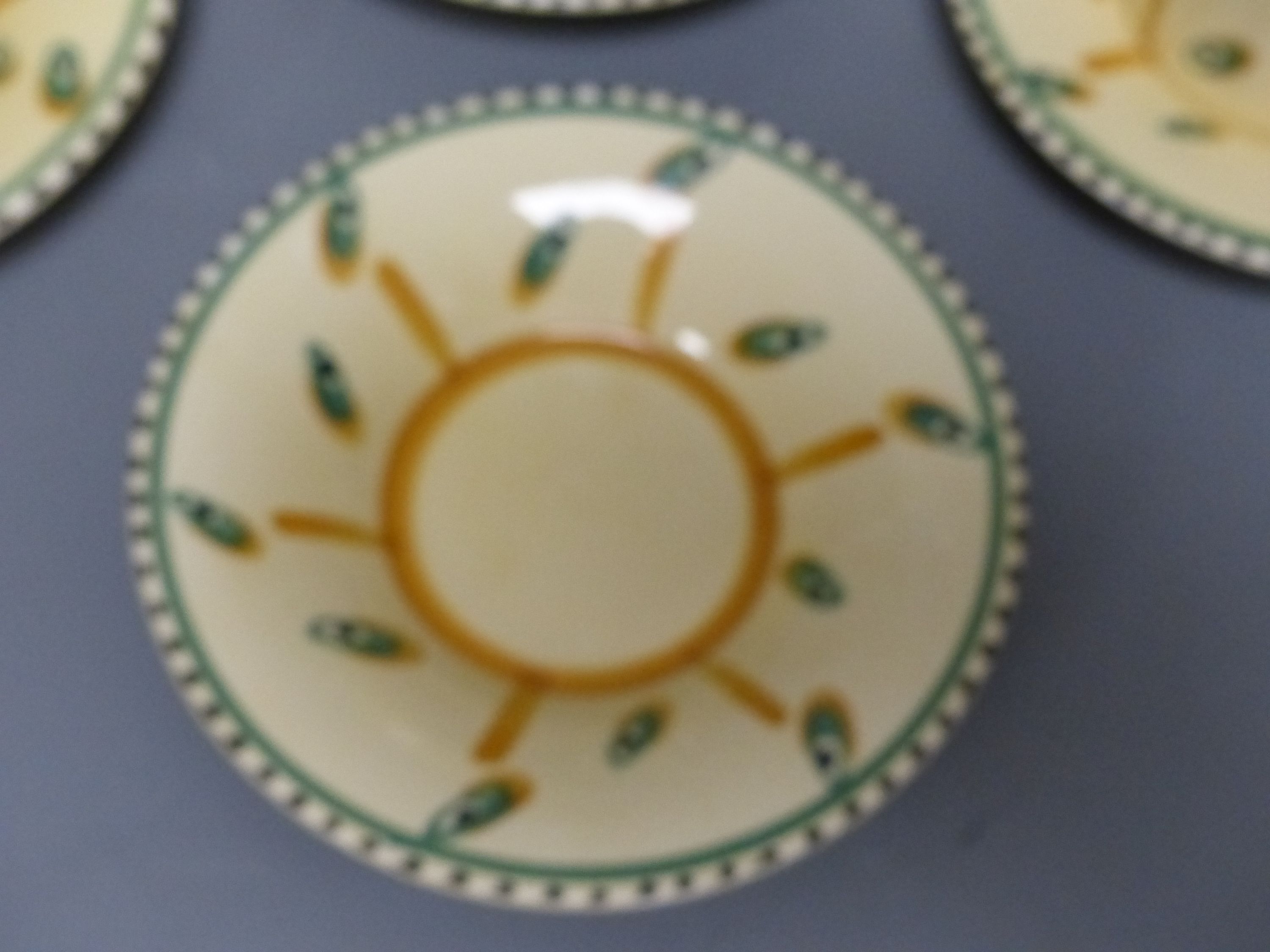 A rare 1930s Susie Cooper coffee set, pattern E283, triangular Susie Cooper Productions mark